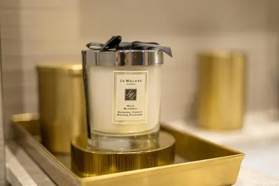 a candle sitting on a tray on a table at Exclusive Burj Khalifa View, Steps From Dubai Mall, Infinity Pool in Dubai