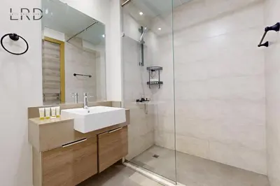 a bathroom with a sink and a shower at Chic and Aesthetic Studio! Move-In Ready in Dubai