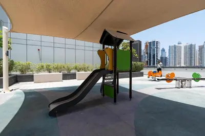 a playground in a building with a slide at Ahlan HH - Stylish Suite Heart of Business Bay Avanti Tower in Dubai
