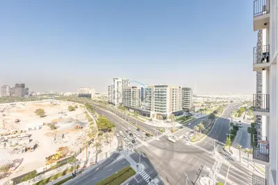 an aerial view of a city with tall buildings at Located Minutes walk to Dubai Hills Park, Near Dubai Hills Mall , Socio Tower 1, Dubai Hills by Deluxe Holiday Homes in Dubai