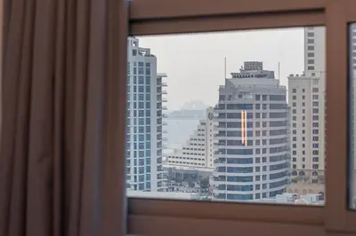 a window with a view of a city at Lux 3BHK in Dubai Marina with Marina View DEC 1306 in Dubai