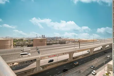 an overhead view of a highway with a train on it at Luxury 3BHK in Dubai Marina DEC 702 in Dubai