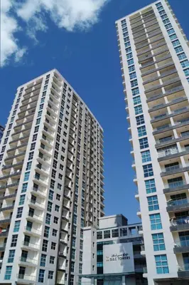 two tall buildings in front of a blue sky at Luxury 4 BHK in Dubai Marina DEC 2102 in Dubai