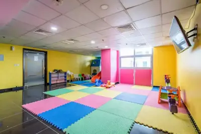 a room with colorful floors and a tv on the ceiling at Luxury 4 BHK in Dubai Marina DEC 2102 in Dubai