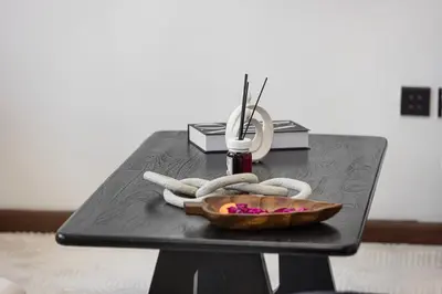 a black table with a bowl of flowers on it at Lux 4BHK in JBR 5 Mins Walk to Beach Sadaf 8 102 in Dubai