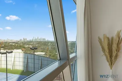 a view of the city from a window in a building at Plush Winter Stay 1BR Park Tower DIFC & Museum in Dubai
