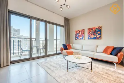 a living room with a couch and a table at Keysplease Great Family 2 BR Apt, Townsquare in Dubai