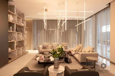 a living room with a couch and chairs and a table at Luxury Apartments - Urban Oasis by Missoni - Business Bay - Canal View - 10 Minutes from Dubai Mall Burj Khalifa in Dubai