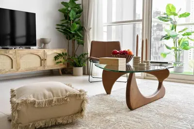 a living room with a coffee table and a chair at DAYF-WST Stunning Marina Views at Marina Promenade in Dubai