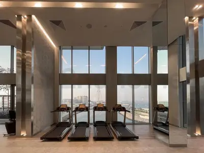 a gym with a view of the city at Tourist Spot, Sea View - Next to Bluewaters & JBR in Dubai