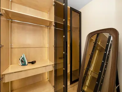 a dressing room with a mirror and a dressing closet at Luxury 2BR Apartment in Dubai Marina with Full Marina View in Dubai