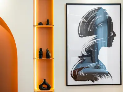 a framed picture of a woman on a wall at Luxury 2BR Apartment in Dubai Marina with Full Marina View in Dubai