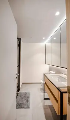 a bathroom with a sink and a toilet at Luxury Upgraded Studio in Wilton Park Residences in Dubai