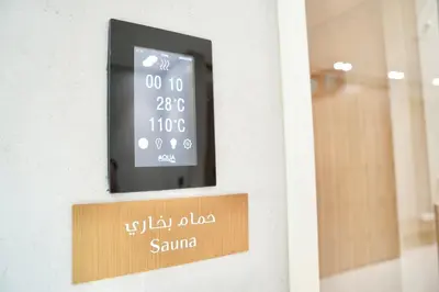 a door with a sign that reads sauna at Private jacuzzi Canal View Infinity Pool in Dubai