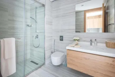 a bathroom with a toilet and a sink and a shower at Frank Porter - Taraf 2 Residence in Dubai