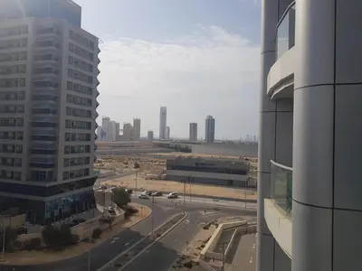 a view of a city from a building at Cricket Tower in Dubai