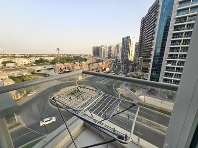 a view of a street in a city with buildings at Cricket Tower in Dubai