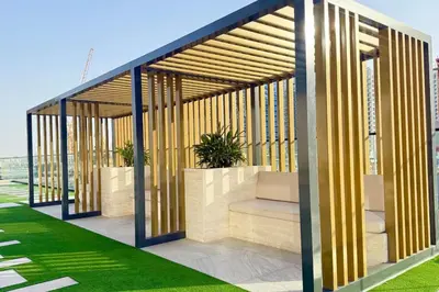 a pavilion with plants in it on a building at Jacuzzi Canal view BusinessBay in Dubai