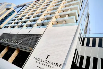 a tall building with the words t building maintenance refugees at Luxury Studio w Jacuzzi Balcony in Dubai