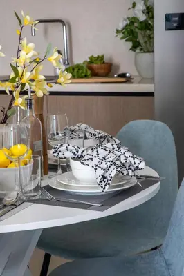 a table with a plate of food on top of it at Frank Porter - Burj Crown in Dubai