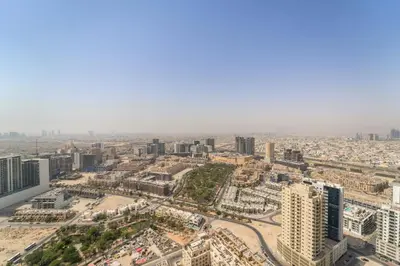 an aerial view of a city with tall buildings at VayK - Cozy Stylish 1BR in JVC in Dubai