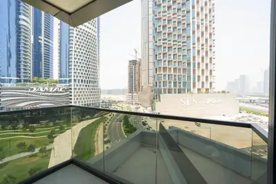a view from the glass floor of a building at Elegant 2BR Apt Nobles Tower with Pool and Gym in Dubai