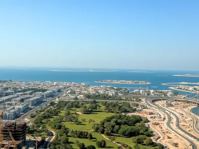 an aerial view of a city and the ocean at Dream Shoma -Cozy Studio In Business Bay in Dubai