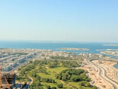 an aerial view of a city and the ocean at Dream Shoma -Cozy Studio In Business Bay in Dubai