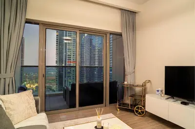 a living room with a view of a city at MBL Lake VIEW 1 BR in Dubai