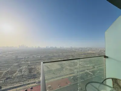a view of a desert from the window of an airplane at Sky-High Studio Marina Skyline View Bloom Tower in Dubai