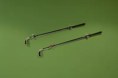 a pair of metal towel racks on a wall at Keyrock Golf Gate - Damac Hills Apartment with Pool, Gym & Free Parking in Dubai