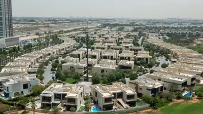an aerial view of an apartment complex at KeyRock Golf Gate - Stylish Retreat with Pool and Gym in Dubai