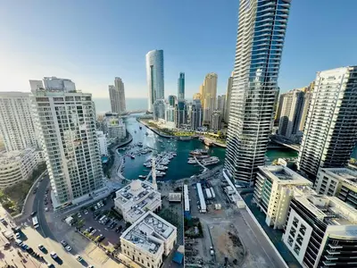 an aerial view of a city with a river and buildings at Upgraded High Rise 2 Br Full Marina Canal View in Dubai