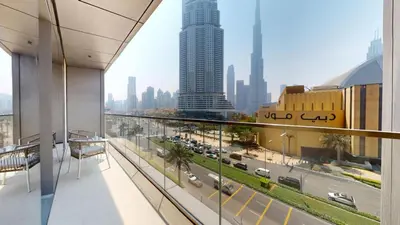 a view of a city skyline from a building at Boulevard Point - One Bed with Burj Khalifa View in Dubai