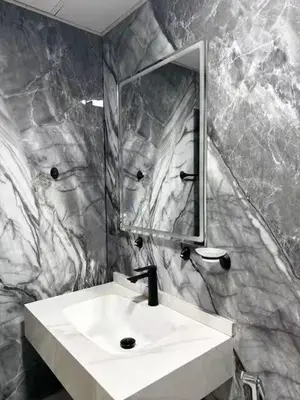 a bathroom with a white sink and a mirror at Luxury 2BR in Dubai Marina Man 912 in Dubai