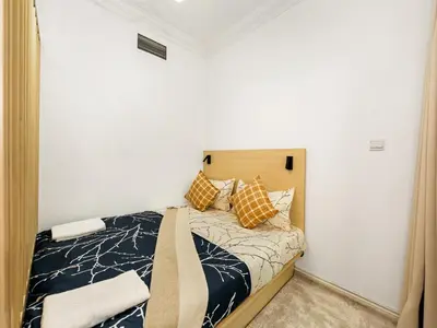 a bedroom with a bed with pillows on it at Luxury 3BHK w Floating Bed in Dubai Marina Man 2805 in Dubai