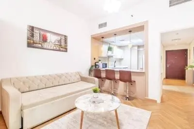 a living room with a couch and a table at Luxury 2BHK in Dubai Marina By dPie MP 1514 in Dubai