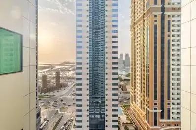 an aerial view of a city with tall buildings at Luxury 2BHK in Dubai Marina By dPie MP 1514 in Dubai