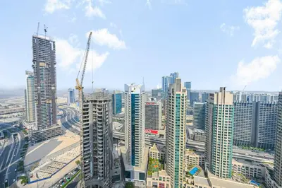 a view of a city with tall buildings at Golden Stays - 5 Mins From Mall I Downtown Dream 1Br Apt in Dubai