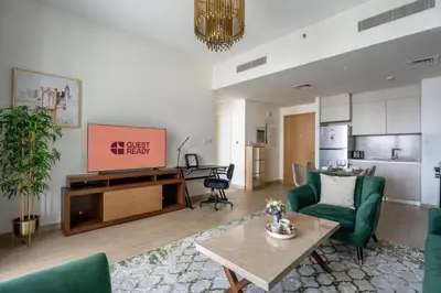 a living room with a couch and a table at GuestReady - Charming stay at Creek Beach in Dubai