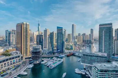 a view of a city with a river and buildings at Panoramic Marina Views Walk to Beach and JBR 1BR in Dubai