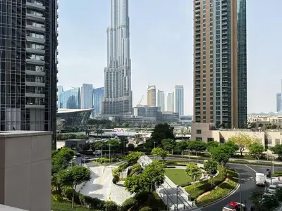 a view of a city skyline with tall buildings at High-Rise Apartment by Burj and Fountain in Dubai