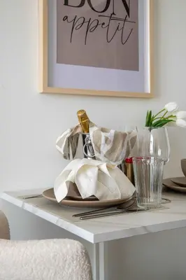 a table with a plate with a napkin on it at Frank Porter - Bloom Tower C in Dubai