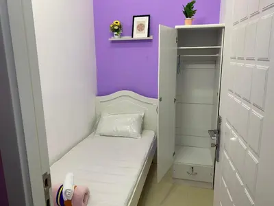 a small room with a small bed in a closet at Elegant Partition Room Al Barsha 1 in Dubai