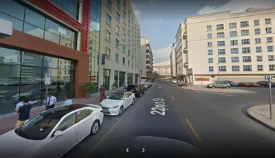 a rendering of a city street with cars parked at Elegant Partition Room Al Barsha 1 in Dubai