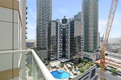 a view of a city with tall buildings at Neat and Cozy 2BR plus Kids Room - 7min to Dubai Mall in Dubai