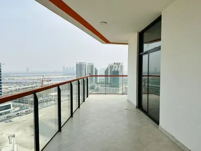 an empty balcony with a view of a city at Fully Furnished and High Floor Unit in Al Jaddaf in Dubai