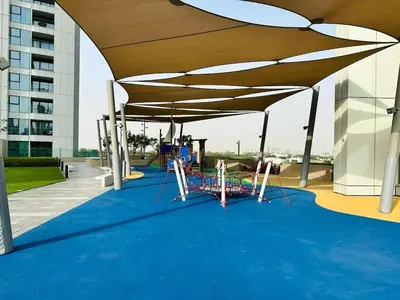 a canopy over a playground on a roof at Zabeel View I Fully Furnished I Prime Location in Dubai