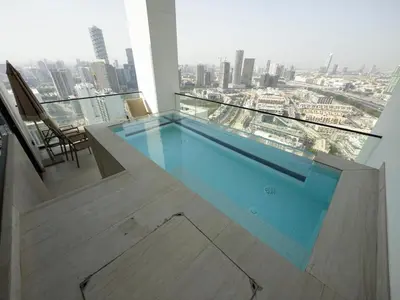a swimming pool on the top of a building at High-End Furnished Homey Elegant with Private Pool in Dubai