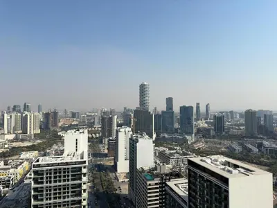 an aerial view of a city with tall buildings at High-End Furnished Homey Elegant with Private Pool in Dubai